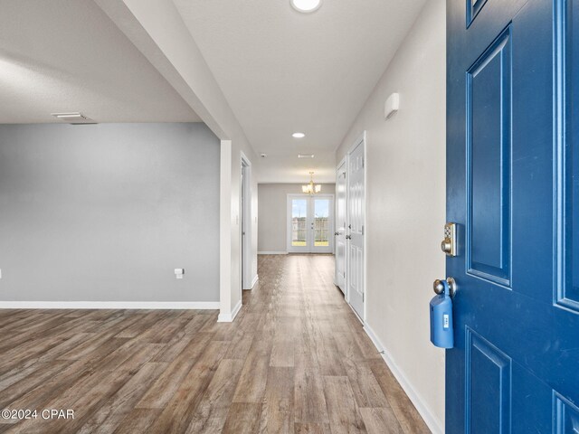 foyer with hardwood / wood-style flooring