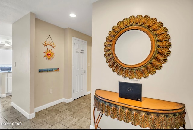 hallway featuring light tile patterned floors