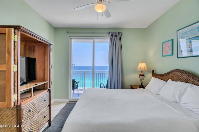 bedroom with light tile patterned floors, ceiling fan, and access to outside