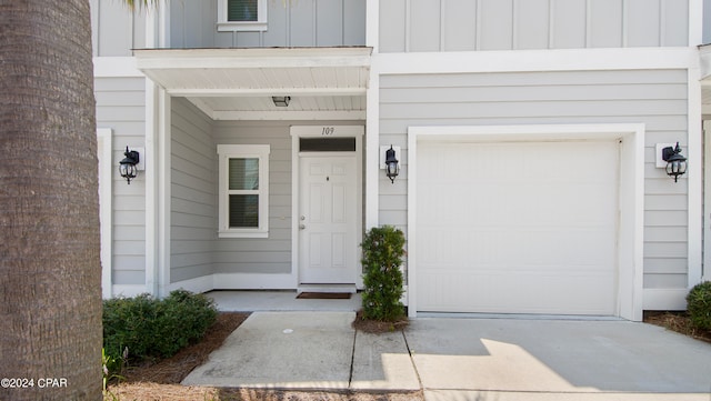 property entrance featuring a garage