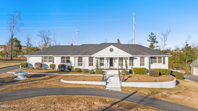 ranch-style house featuring a porch