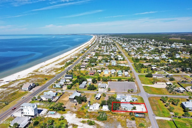 aerial view with a beach view and a water view