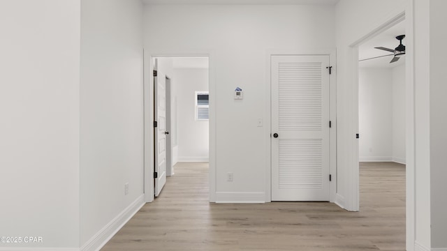 hall with light wood-type flooring