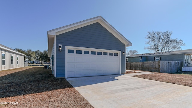 garage with fence