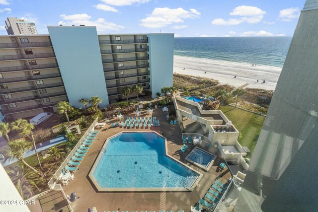 drone / aerial view with a view of the beach and a water view