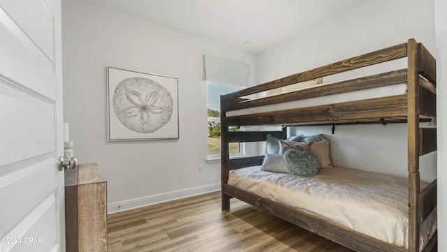 bedroom featuring light wood-type flooring