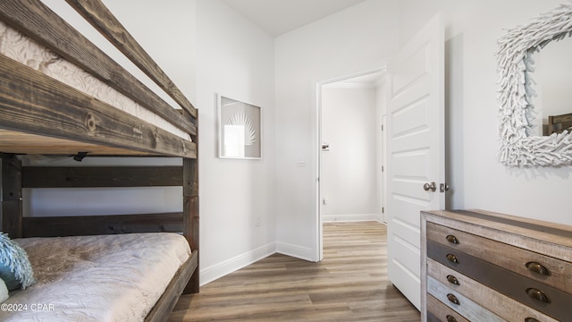 bedroom featuring hardwood / wood-style flooring