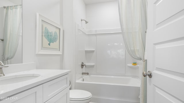 full bathroom featuring vanity, toilet, and shower / tub combination