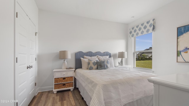 bedroom featuring dark hardwood / wood-style floors