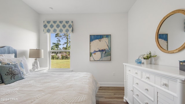 bedroom with light hardwood / wood-style floors