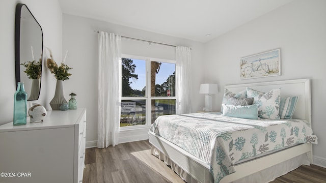 bedroom featuring hardwood / wood-style flooring