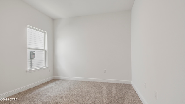 empty room with carpet flooring