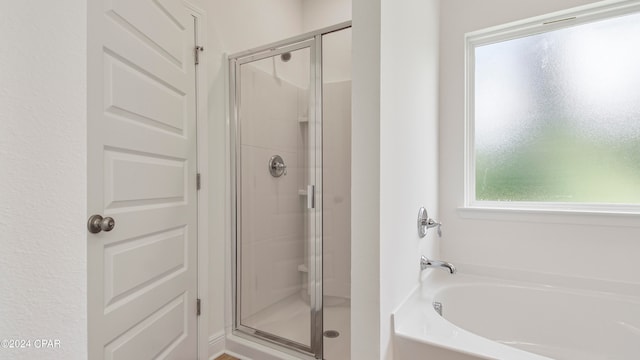 bathroom with independent shower and bath