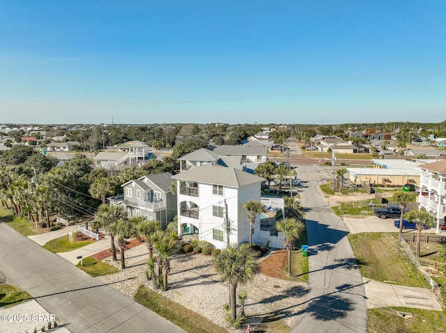 birds eye view of property with a residential view