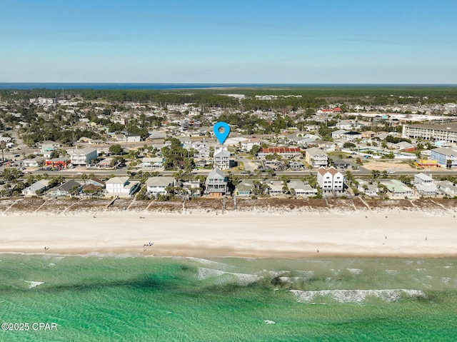 bird's eye view with a water view, a residential view, and a view of the beach