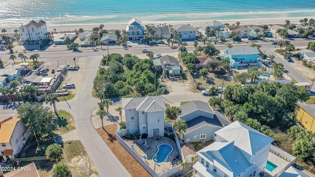 drone / aerial view with a view of the beach and a water view