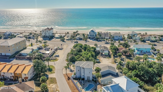 bird's eye view with a view of the beach and a water view