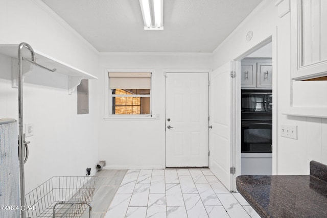 washroom with light tile patterned flooring and ornamental molding