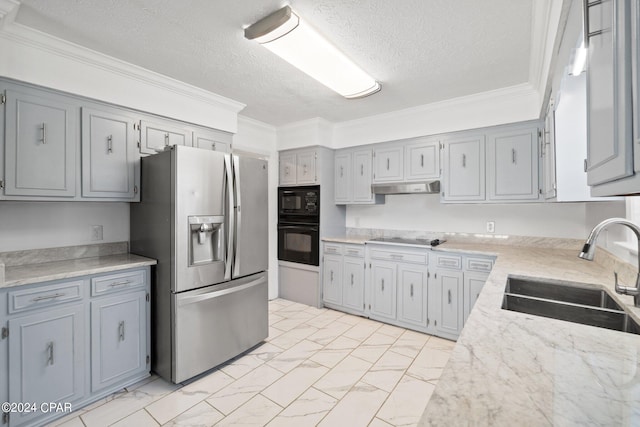 kitchen with sink, black appliances, and crown molding