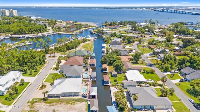 birds eye view of property featuring a water view