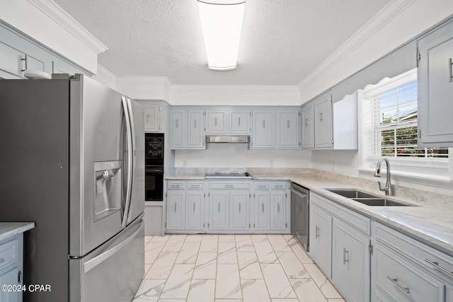 kitchen with sink, ornamental molding, light tile patterned floors, and black appliances