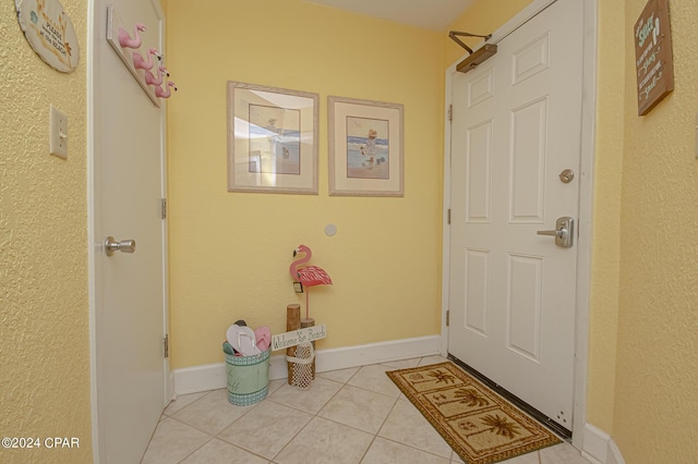 interior space with light tile patterned floors