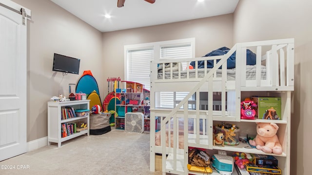 carpeted bedroom featuring ceiling fan