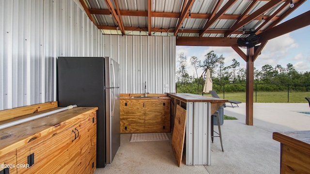 view of patio with a wet bar