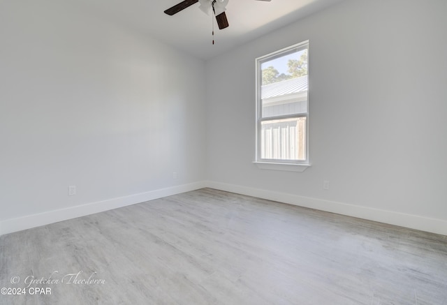 unfurnished room featuring ceiling fan and light hardwood / wood-style floors