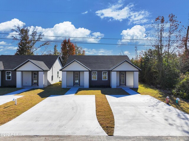 view of front of property with a front lawn