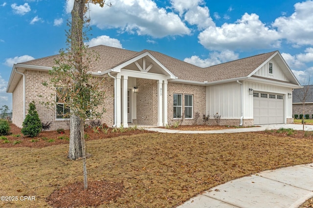 single story home featuring a garage and a front yard