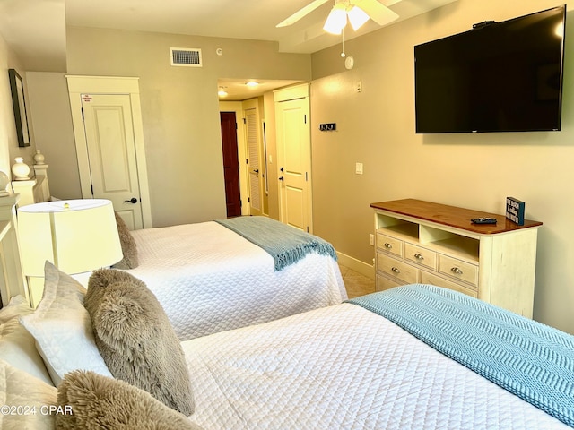 bedroom featuring ceiling fan