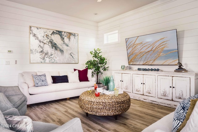 living room with dark hardwood / wood-style flooring