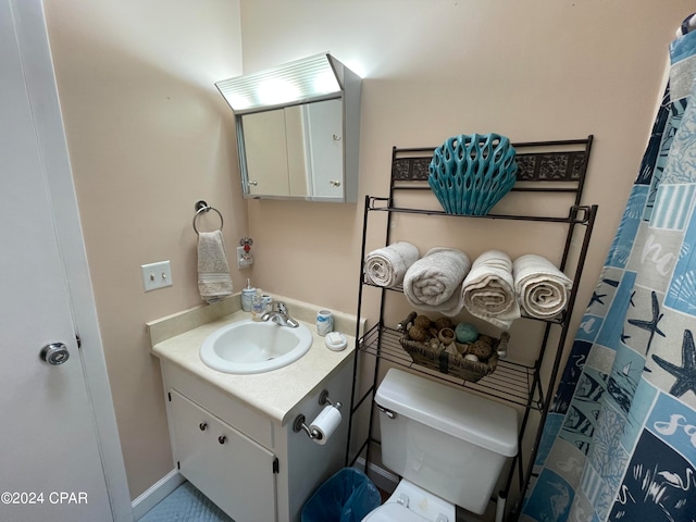 bathroom with vanity and toilet