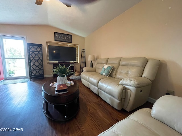 living room featuring dark hardwood / wood-style flooring, ceiling fan, and lofted ceiling