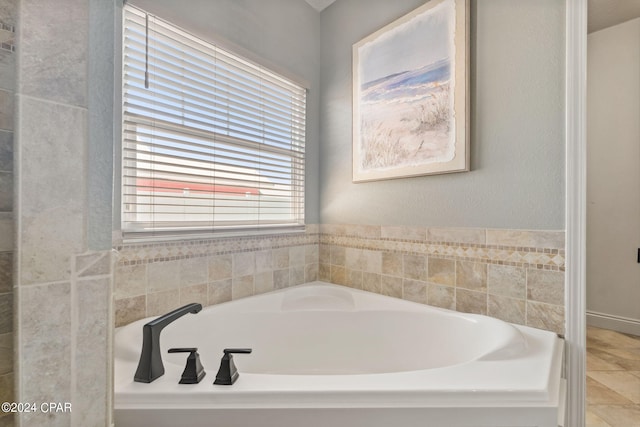 bathroom with a tub to relax in