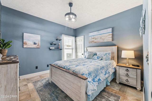 bedroom with a textured ceiling