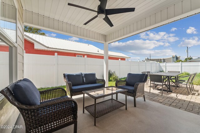 view of patio featuring outdoor lounge area and ceiling fan