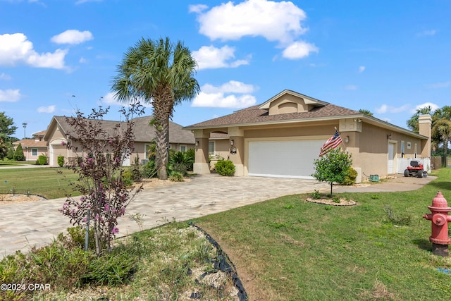 ranch-style house with a front yard and a garage