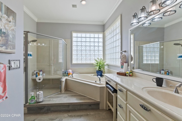 bathroom featuring vanity, shower with separate bathtub, a notable chandelier, wood-type flooring, and ornamental molding