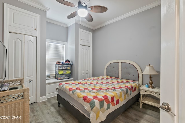 bedroom featuring crown molding, wood-type flooring, and ceiling fan