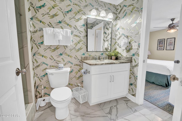 bathroom with ceiling fan, toilet, and vanity