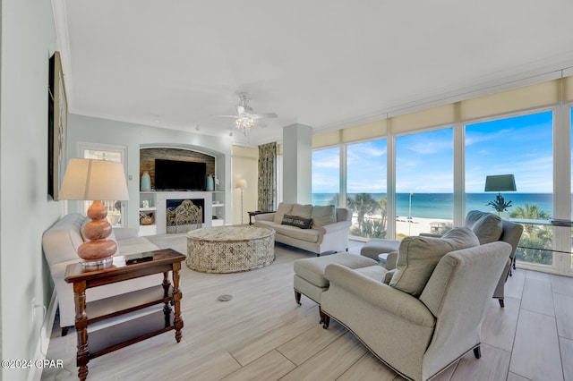 living room featuring light hardwood / wood-style flooring and ceiling fan