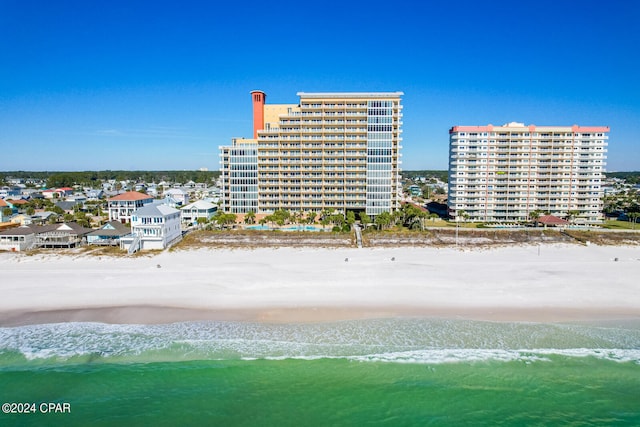 aerial view featuring a water view and a view of the beach