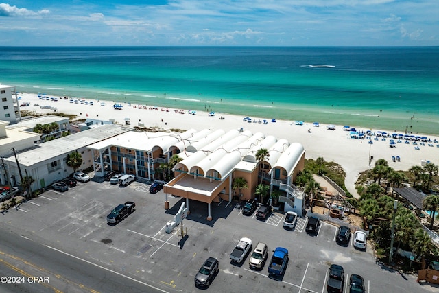aerial view with a beach view and a water view