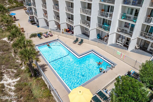 view of swimming pool featuring a patio