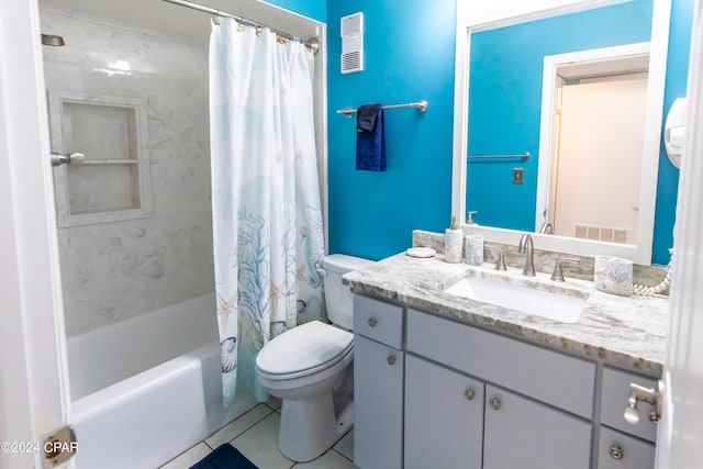 full bathroom with shower / bath combo with shower curtain, tile patterned flooring, toilet, and vanity