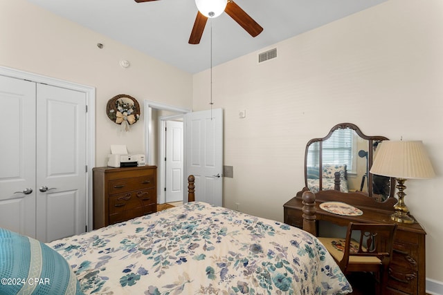 bedroom with ceiling fan and a closet