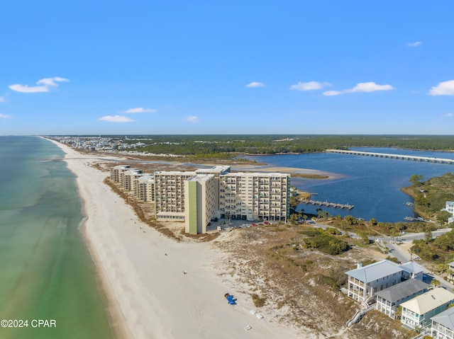 bird's eye view featuring a beach view and a water view