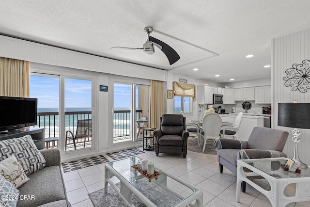 23223 Front Beach Rd Unit Ph-06, Panama City Beach, FL 32413 - living room featuring a ceiling fan, light tile patterned floors, and recessed lighting